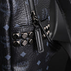 MCM Stark Visetos Medium Backpack – Black Monogram with Studded Detailing