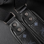 MCM Stark Visetos Medium Backpack – Black Monogram with Studded Detailing