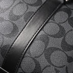 Coach Signature Duffel Bag – Black Monogram Canvas with Leather Trim