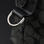 Coach Metropolitan Duffel Bag in Signature Black Canvas